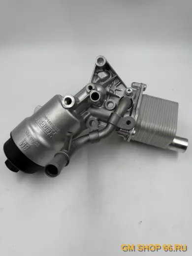 Корпус масляного фильтра с теплообменником GM 55566784, General Motors для Opel Astra J/Corsa D/Mokka/Meriva B/Zafira C; Chevrolet Cruze/Aveo T300/Orlando — фото 1 из 11