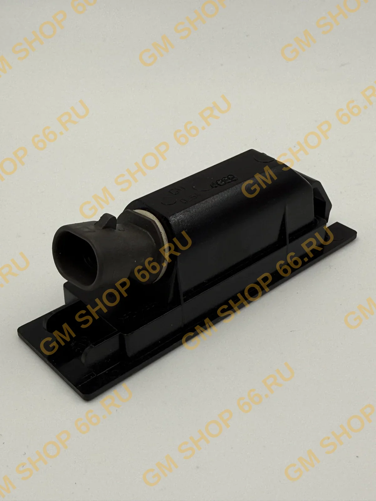 Фонарь подсветки номера GM 13251936, Световые приборы, General Motors для Opel Astra H/Astra J/Corsa D/Insignia A/Meriva B/Vectra C — фото 1 из 5