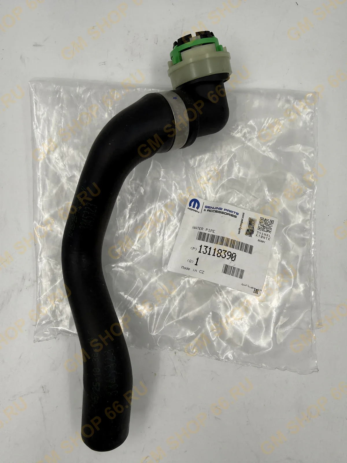 Патрубок отопителя салона выпускной GM 13118390, General Motors для Opel Astra H/Zafira B